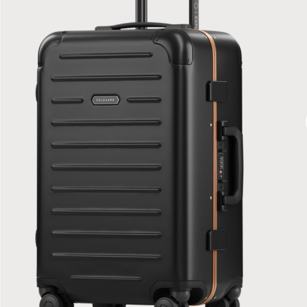 Solgaard Black Luggage with Copper Trim